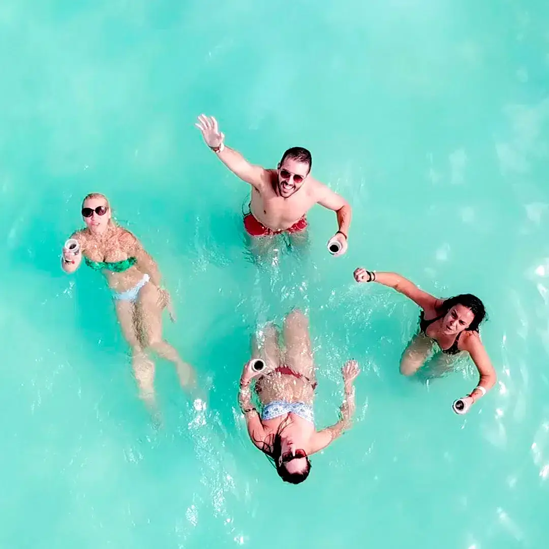 Aerial photo of a group enjoying themselves on the beach