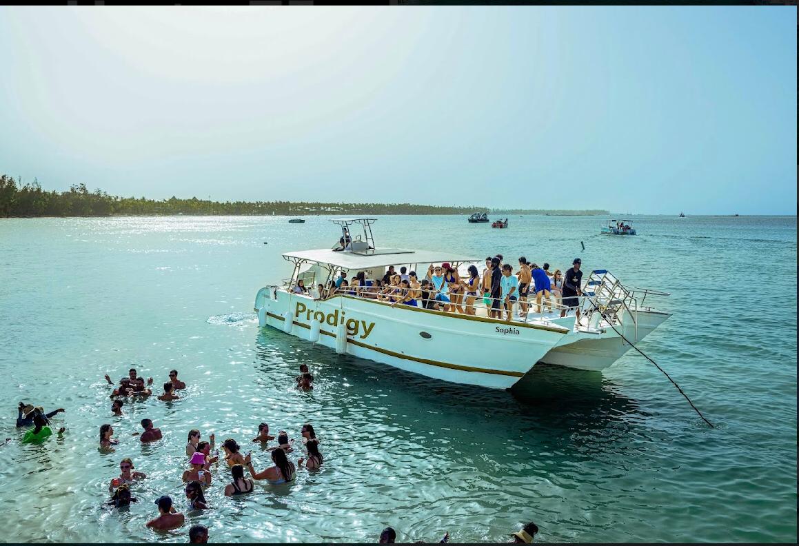 People enjoying the party at the natural pool